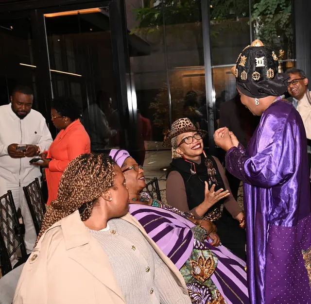 H.E. Rev. Dr. Ocansey in conversation with guests at the reception